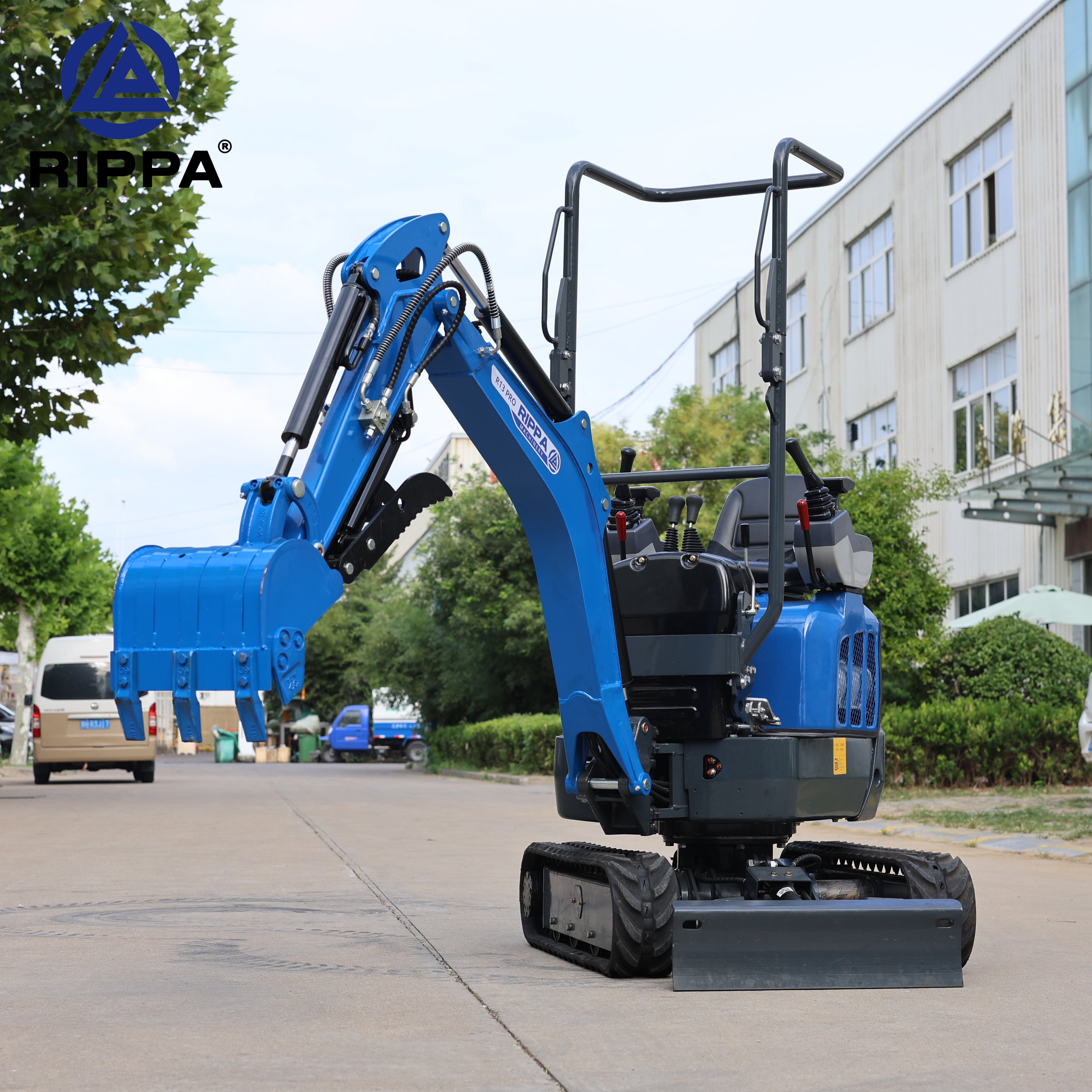 Compact excavator with attachments showcased on a street, ideal for construction and landscaping tasks
