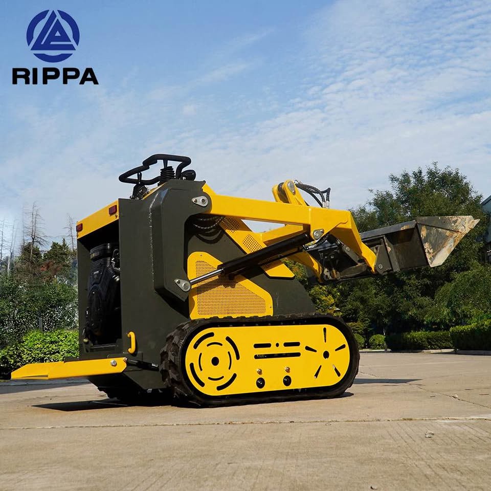 Compact Skid Steer loader with a front bucket, ideal for construction and landscaping tasks